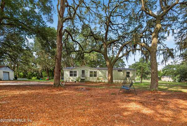 2.25 Acres of Land with Home for Sale in Crescent City, Florida