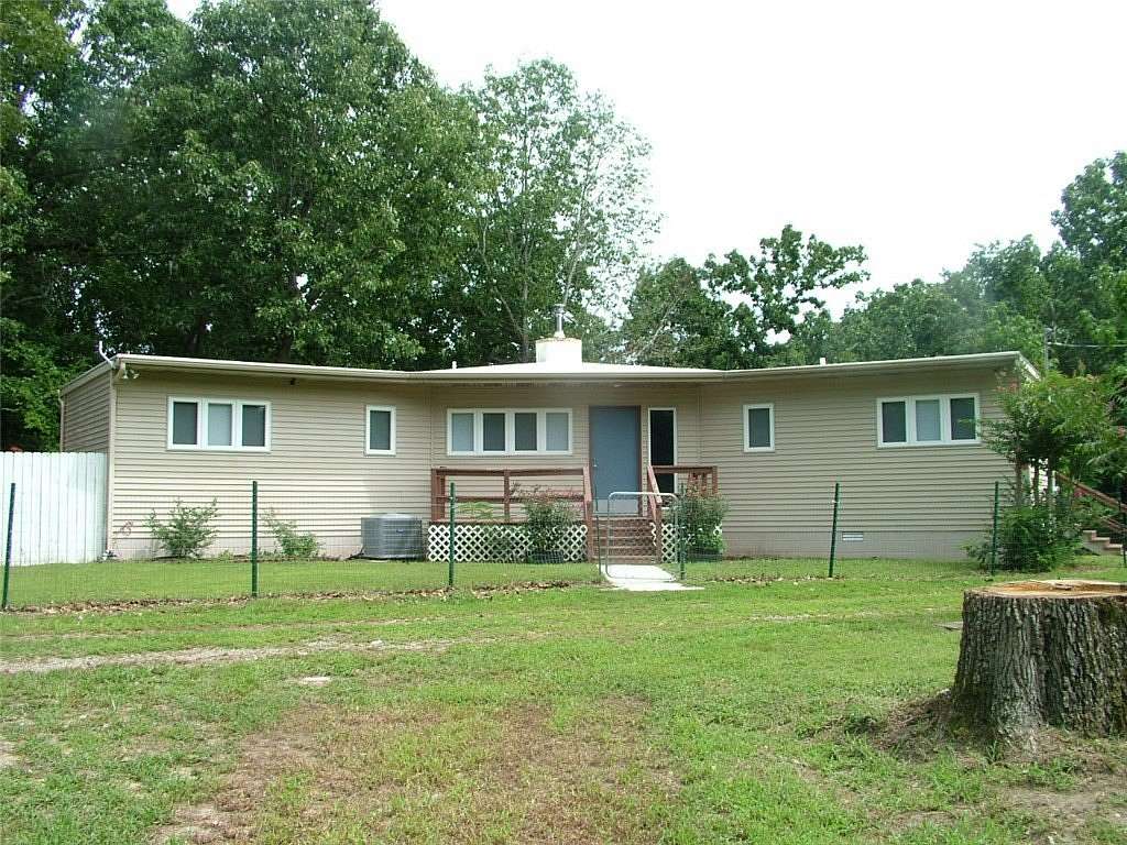 5.27 Acres of Land with Home for Sale in Mountain Home, Arkansas