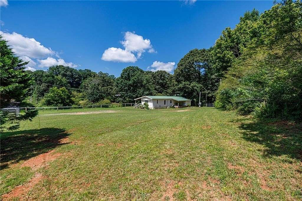 4 Acres of Land with Home for Sale in Alpharetta, Georgia