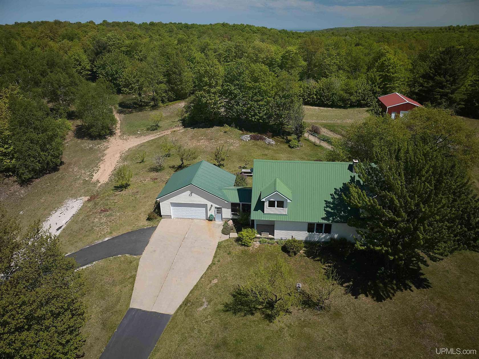70 Acres of Recreational Land with Home for Sale in Munising, Michigan