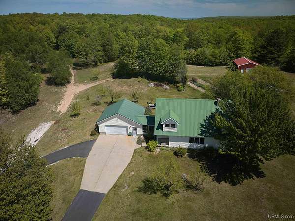 70 Acres of Recreational Land with Home for Sale in Munising, Michigan