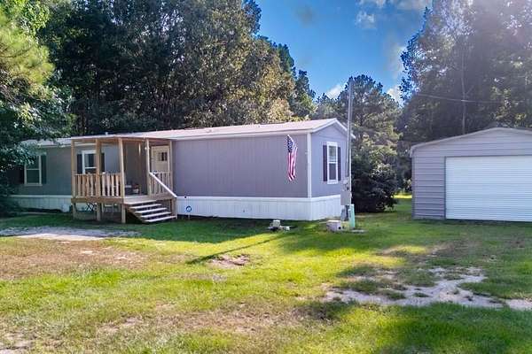 6.82 Acres of Land with Home for Sale in Zavalla, Texas