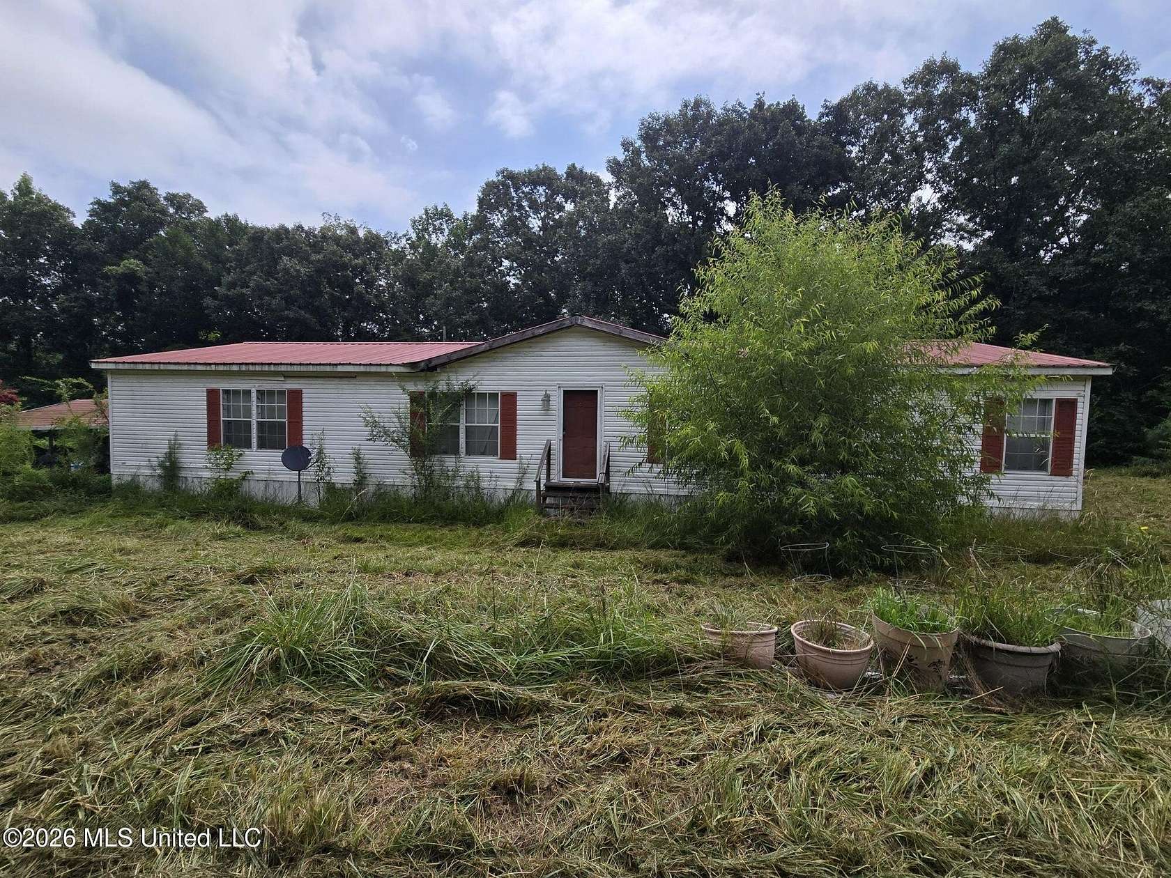 8.1 Acres of Land with Home for Sale in Holly Springs, Mississippi