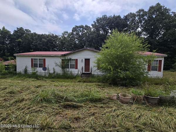 8.1 Acres of Land with Home for Sale in Holly Springs, Mississippi