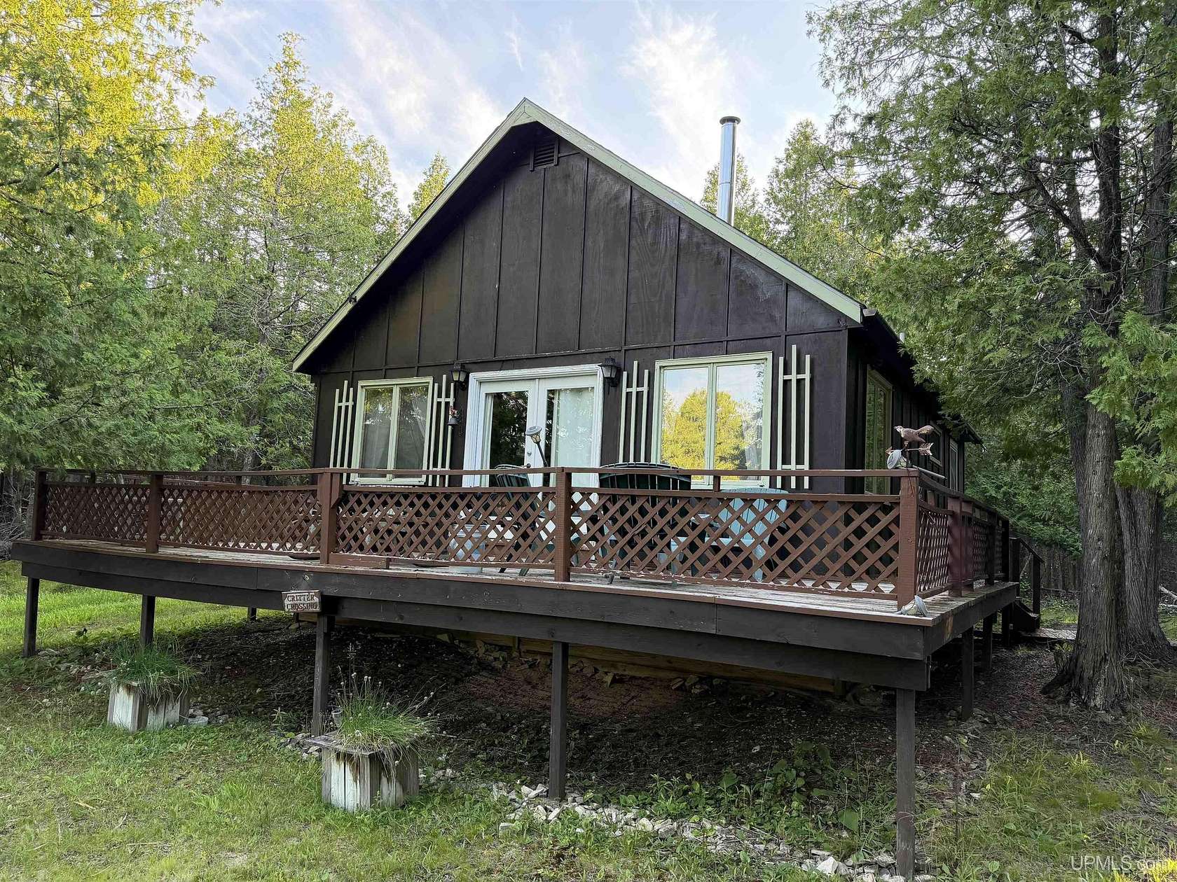 20 Acres of Recreational Land with Home for Sale in Garden, Michigan