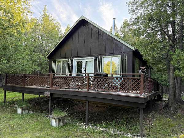 20 Acres of Recreational Land with Home for Sale in Garden, Michigan