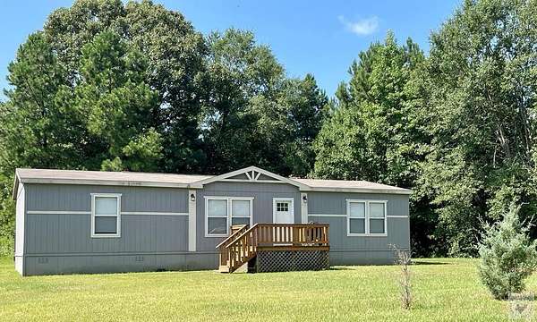 2 Acres of Land with Home for Sale in Atlanta, Texas