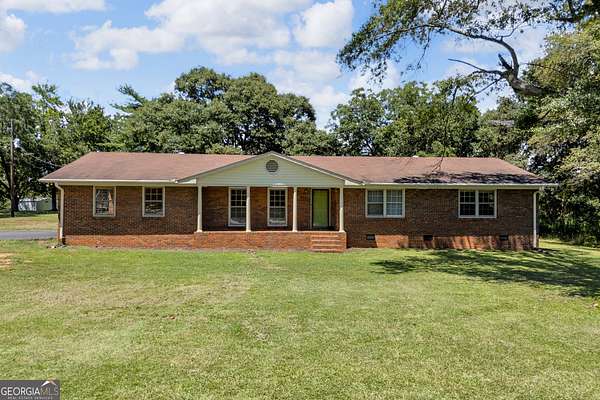 31.1 Acres of Land with Home for Sale in Bowersville, Georgia