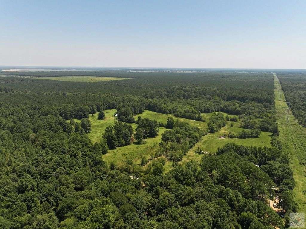77 Acres of Land with Home for Sale in De Kalb, Texas