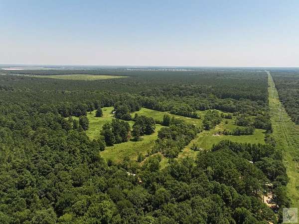 77 Acres of Land with Home for Sale in De Kalb, Texas