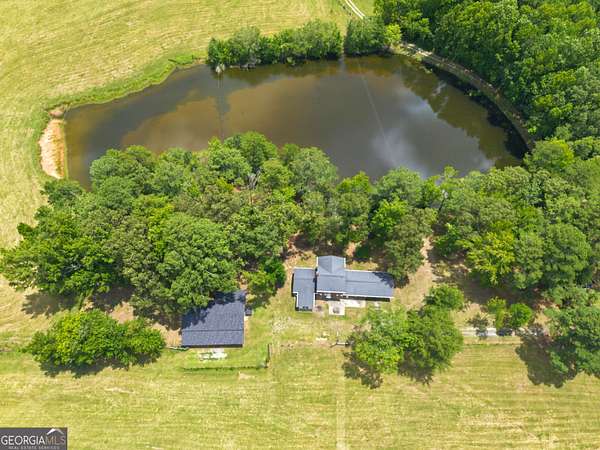 55.2 Acres of Land with Home for Sale in Brooks, Georgia