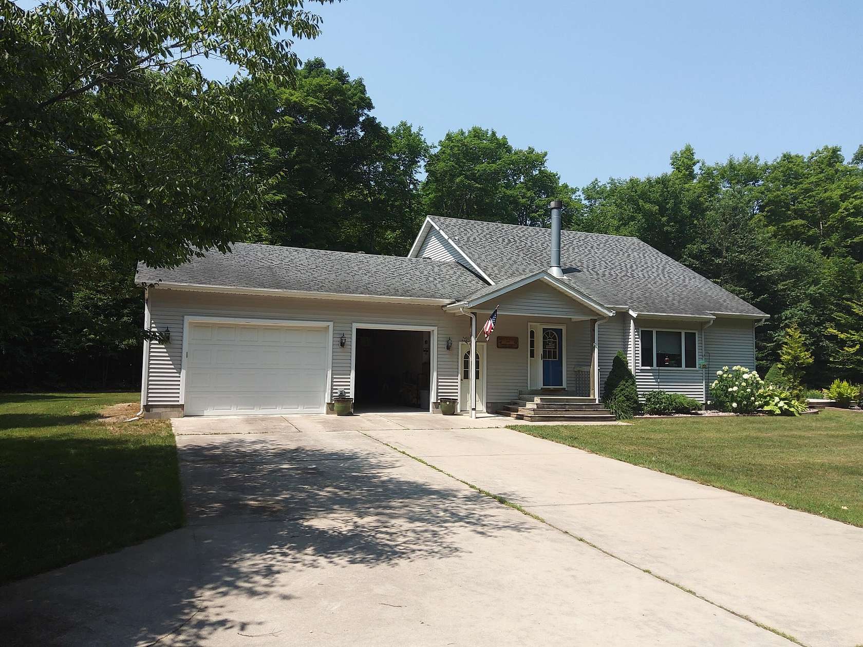 20 Acres of Recreational Land with Home for Sale in Curtis, Michigan
