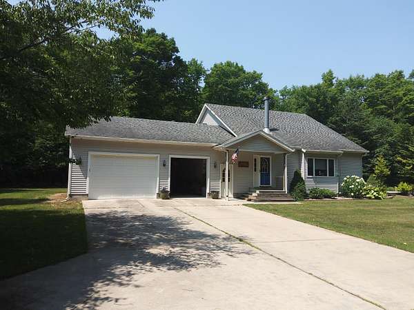 20 Acres of Recreational Land with Home for Sale in Curtis, Michigan