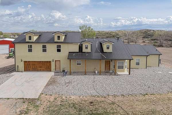 9.79 Acres of Land with Home for Sale in Veguita, New Mexico