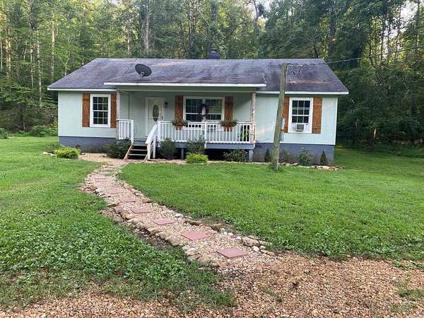 4.74 Acres of Land with Home for Sale in Savannah, Tennessee