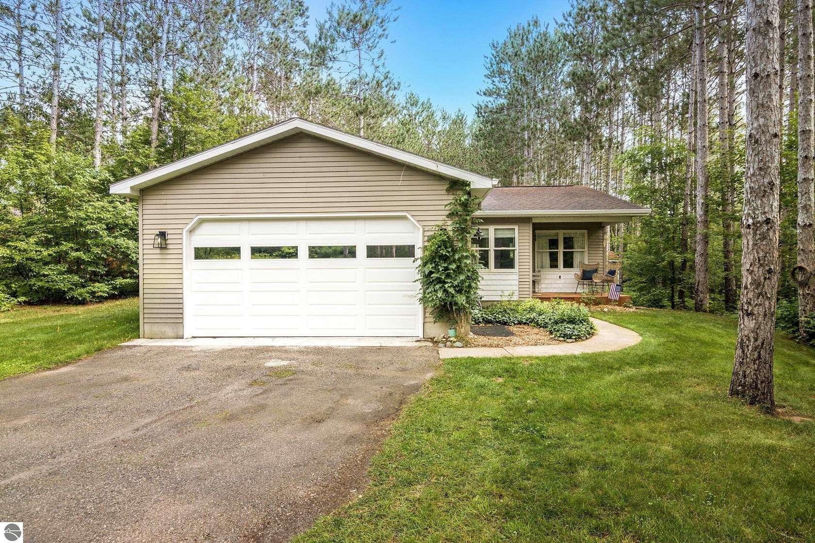 1.62 Acres of Land with Home for Sale in Lake Ann, Michigan