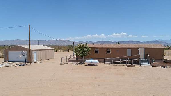 2.57 Acres of Land with Home for Sale in Golden Valley, Arizona