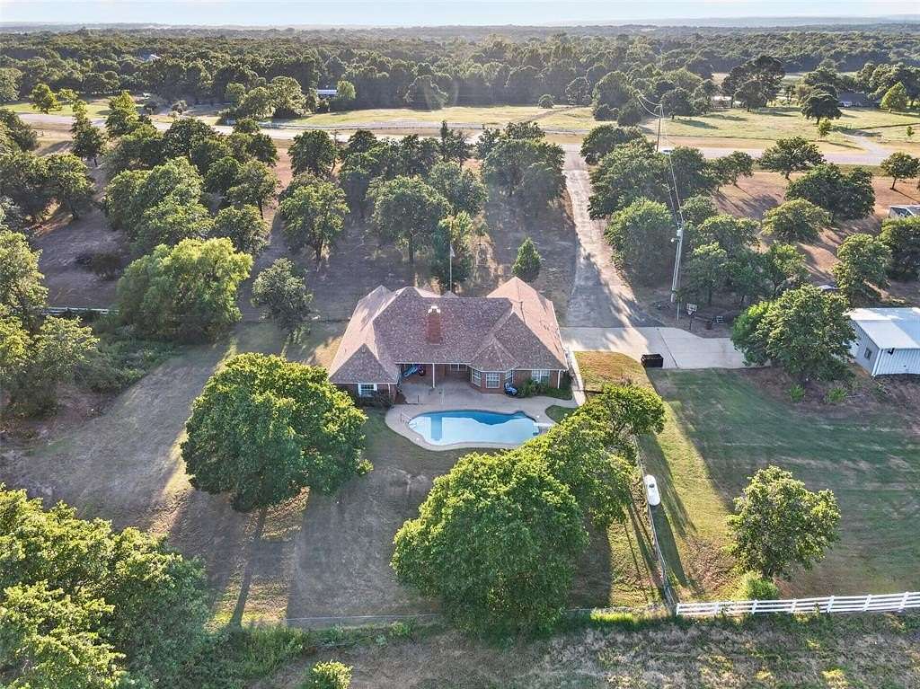 7.8 Acres of Land with Home for Sale in Wellston, Oklahoma