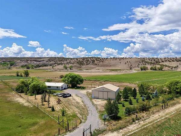 3 Acres of Land with Home for Sale in Montrose, Colorado