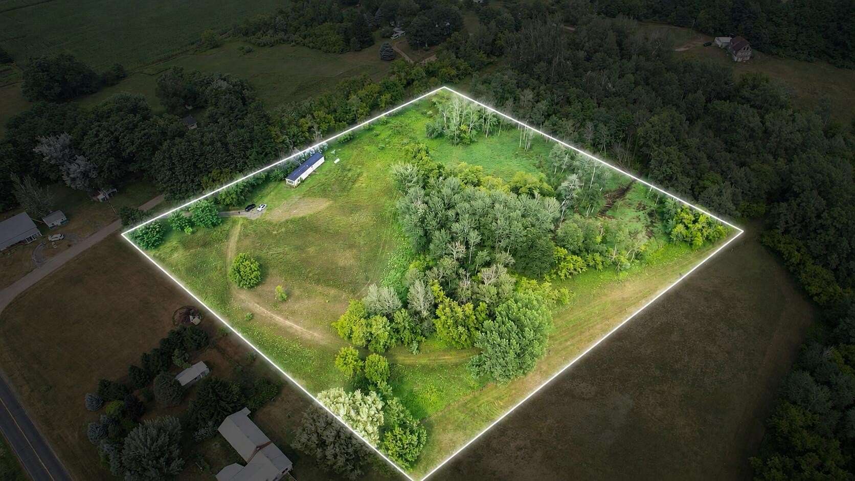 7 Acres of Land with Home for Sale in Stanton, Michigan