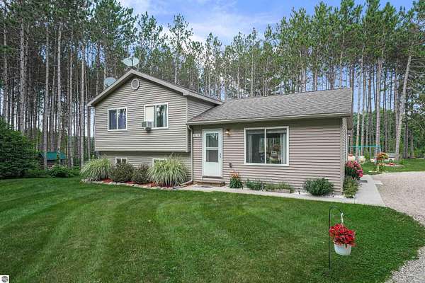 2.5 Acres of Land with Home for Sale in Kingsley, Michigan