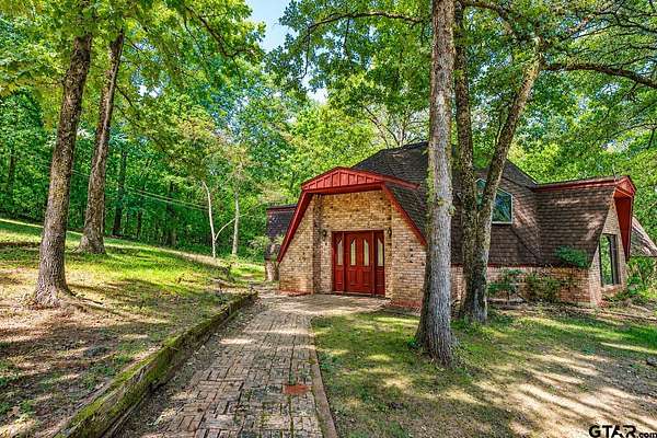 5 Acres of Land with Home for Sale in Rusk, Texas