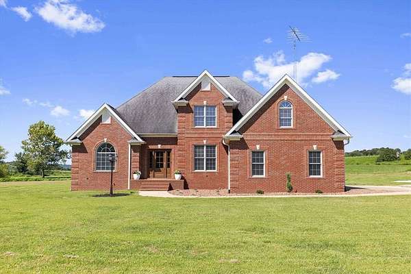 6.4 Acres of Land with Home for Sale in Utica, Kentucky