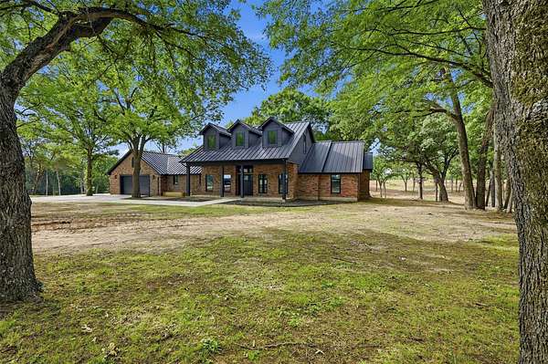 2.5 Acres of Land with Home for Sale in Sadler, Texas