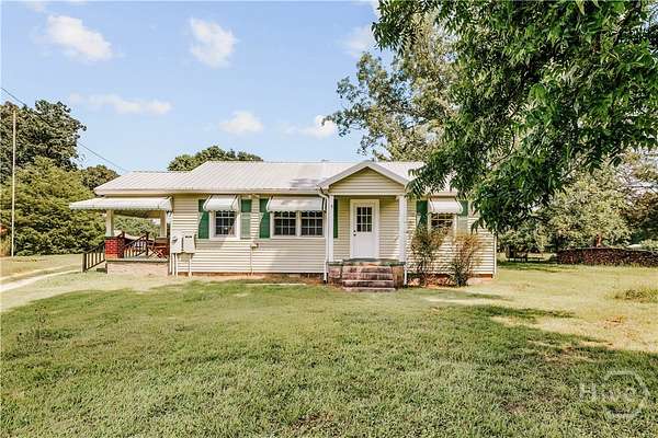 28.6 Acres of Land with Home for Sale in Carlton, Georgia