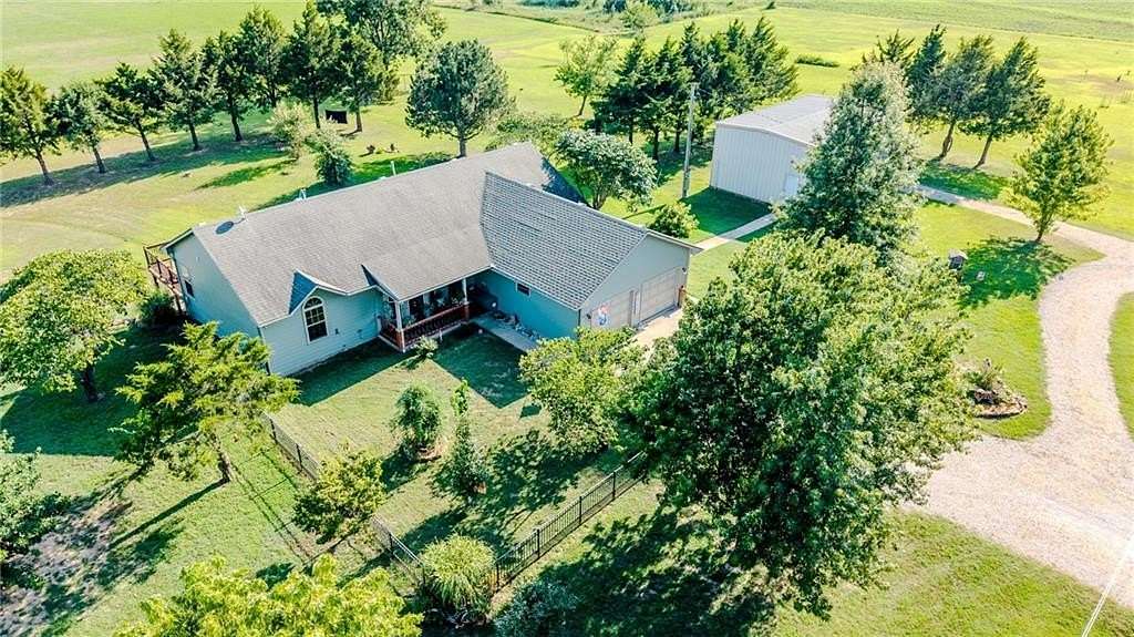5.7 Acres of Land with Home for Sale in Chanute, Kansas