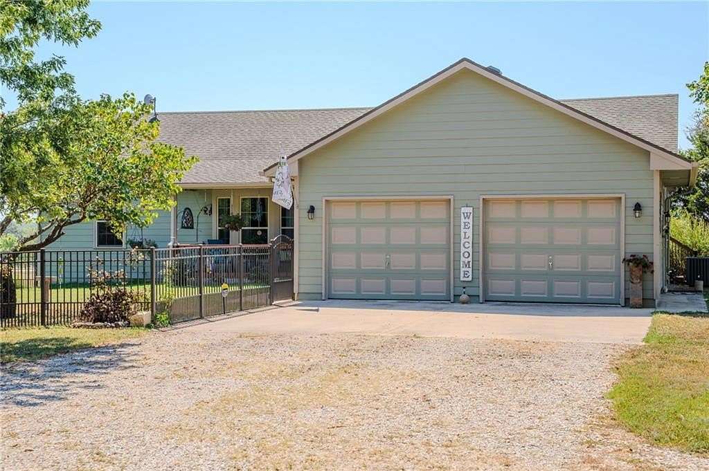 5.7 Acres of Land with Home for Sale in Chanute, Kansas