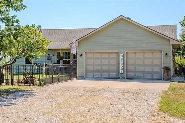 5.7 Acres of Land with Home for Sale in Chanute, Kansas