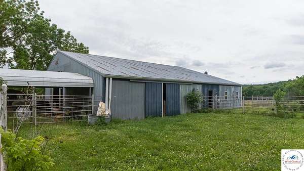 23.5 Acres of Land with Home for Sale in Cole Camp, Missouri