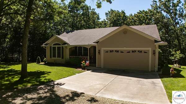 8 Acres of Land with Home for Sale in Clinton, Missouri