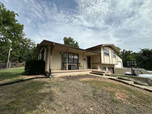 10 Acres of Land with Home for Sale in Carthage, Missouri
