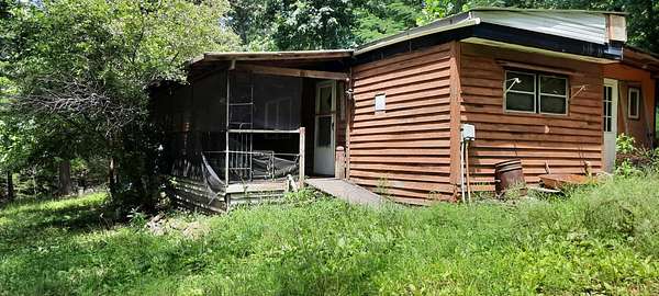 5 Acres of Land with Home for Sale in Viburnum, Missouri