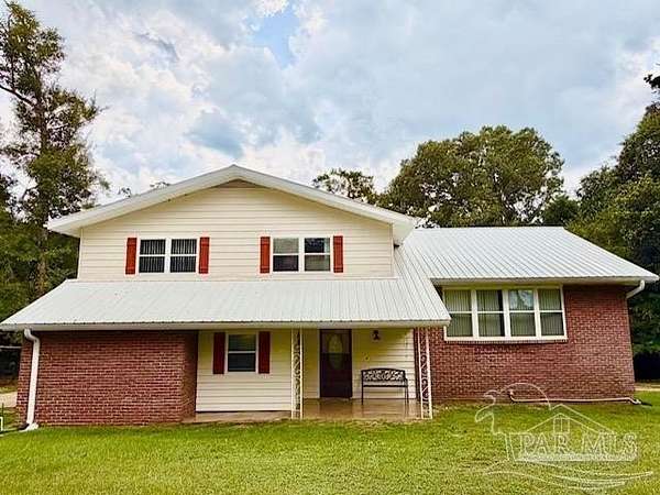 5.3 Acres of Land with Home for Sale in Jay, Florida