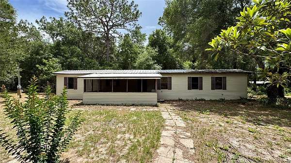 3 Acres of Land with Home for Sale in Belleview, Florida