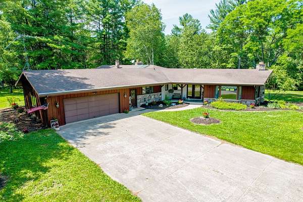 8.52 Acres of Land with Home for Auction in Cecil, Wisconsin