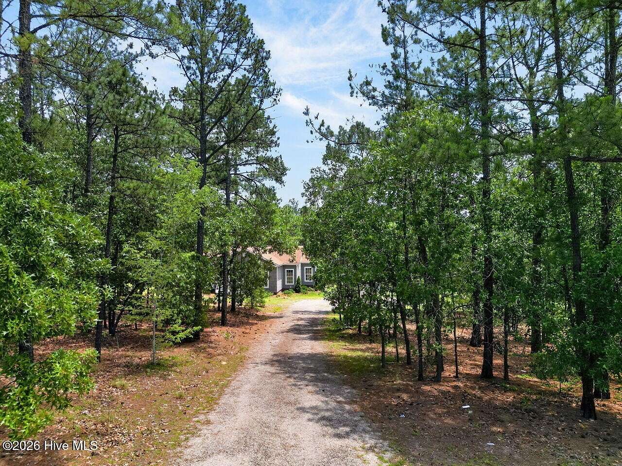 6.87 Acres of Land with Home for Sale in Aberdeen, North Carolina