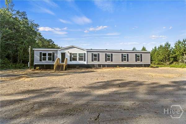 5.26 Acres of Land with Home for Sale in Ludowici, Georgia