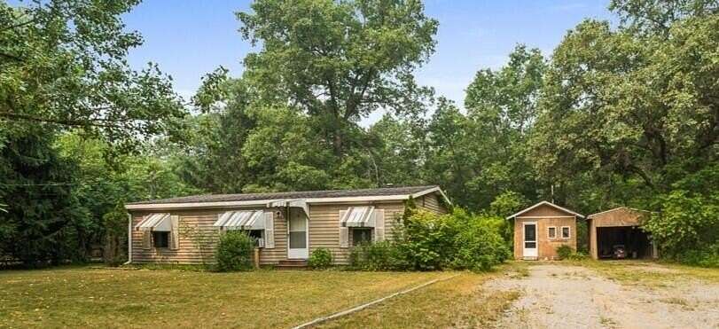 7 Acres of Land with Home for Sale in Whitehall, Michigan