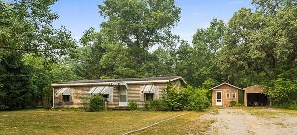 7 Acres of Land with Home for Sale in Whitehall, Michigan