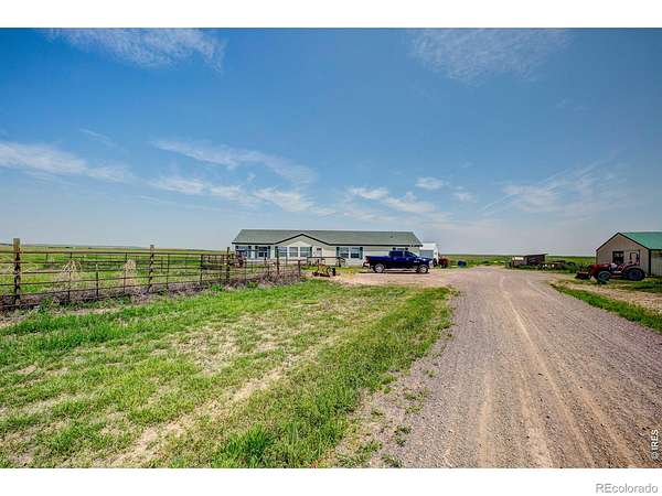 79 Acres of Agricultural Land with Home for Sale in Briggsdale, Colorado