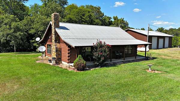25.8 Acres of Land with Home for Sale in Hatfield, Arkansas