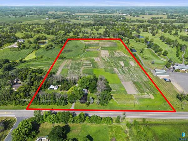 19.8 Acres of Land with Home for Sale in Rogers, Minnesota