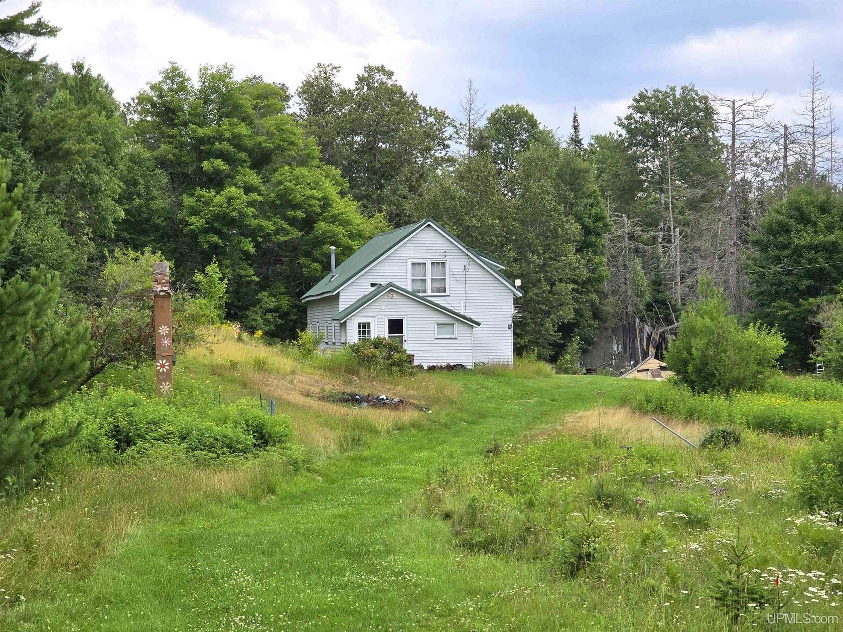 37 Acres of Recreational Land with Home for Sale in Champion, Michigan