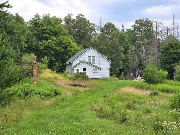 37 Acres of Recreational Land with Home for Sale in Champion, Michigan