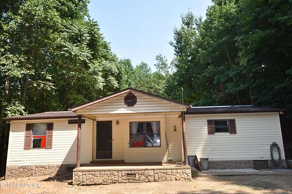 29.9 Acres of Recreational Land with Home for Sale in Rocky Top, Tennessee