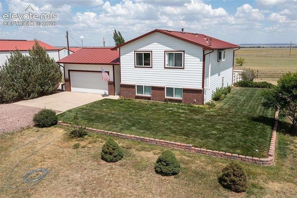 5 Acres of Land with Home for Sale in Peyton, Colorado